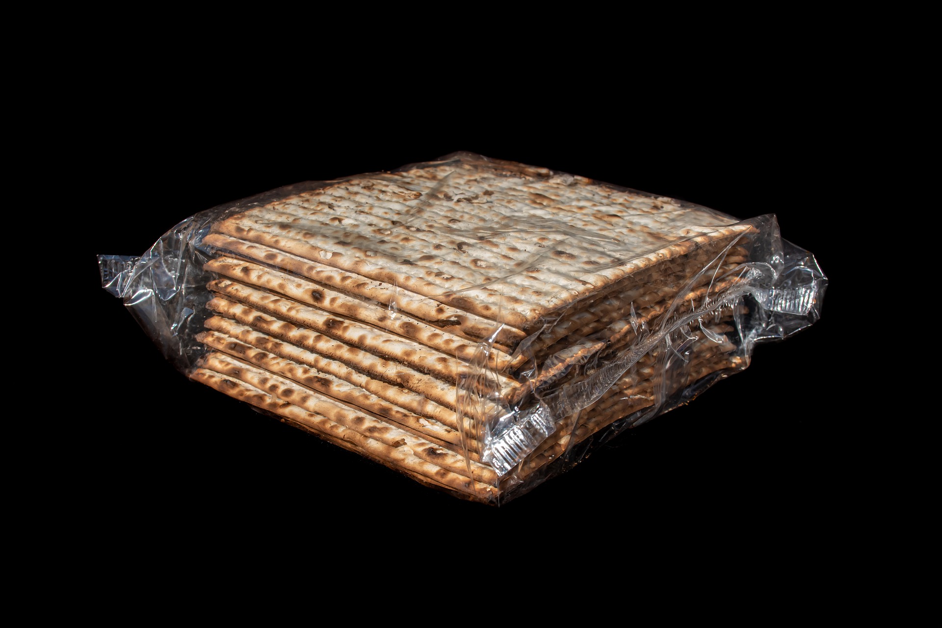A stack of matzahs in a clear wrapper