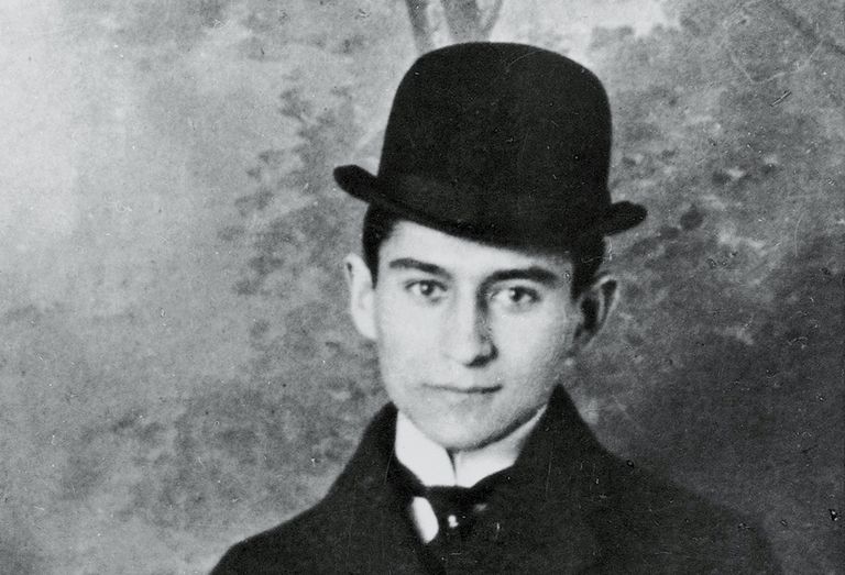 Franz Kafka wearing a bowler hat